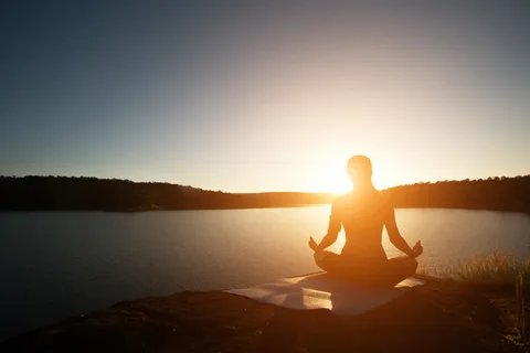 A person meditating peacefully